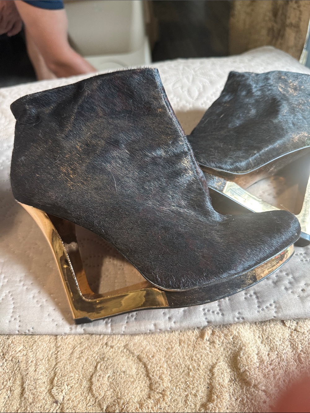BCBGMaxAzria Black Ankle Wedge Boots with Gold Cutout Heel